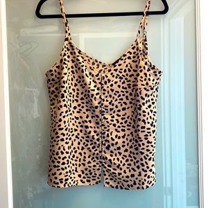 Animal print tank with button detail in the front.